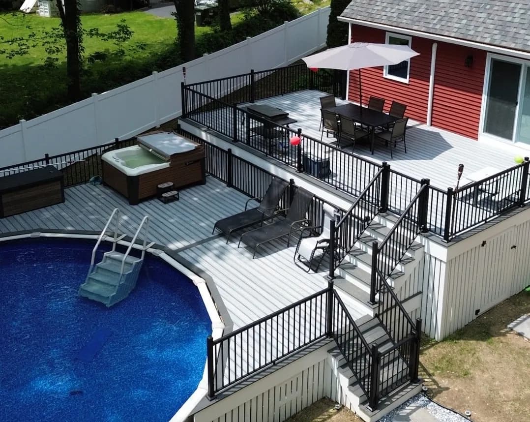 Deck around a pool, completed by Sustainable Decks